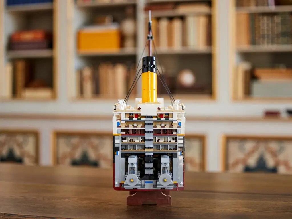 Close-up of LEGO ship with bookshelf backdrop