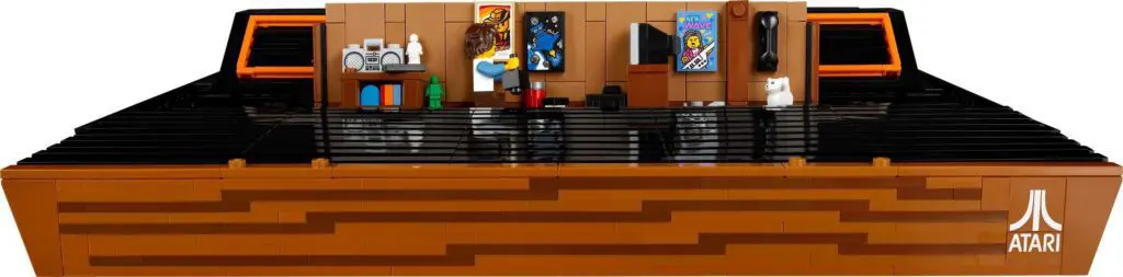 Retro Atari console with miniature gaming setup