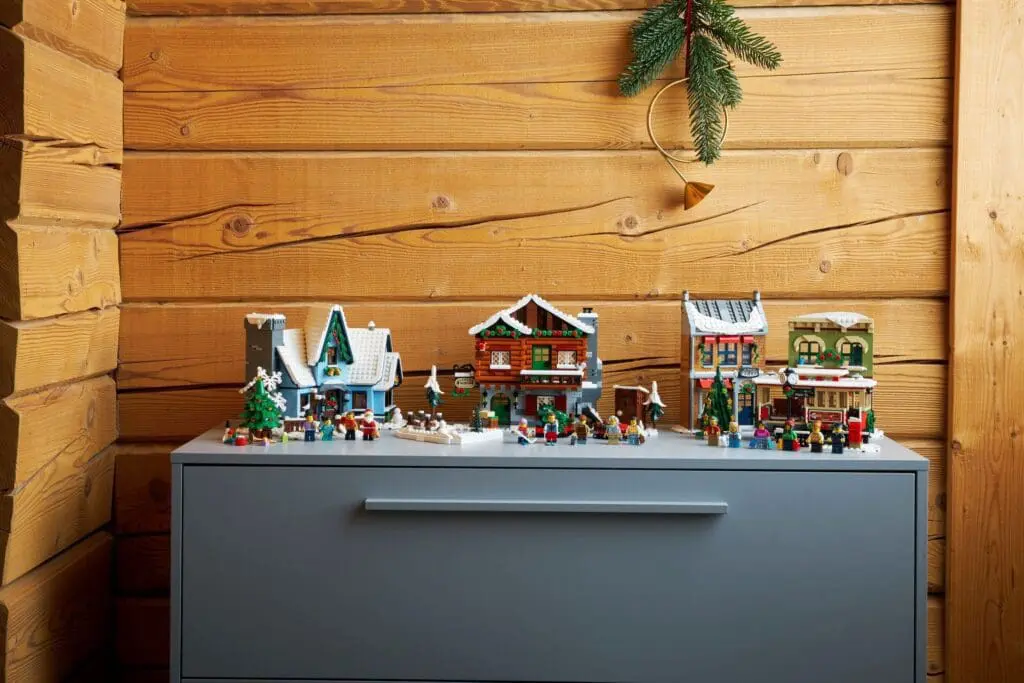 Snowy village display with tiny decorations