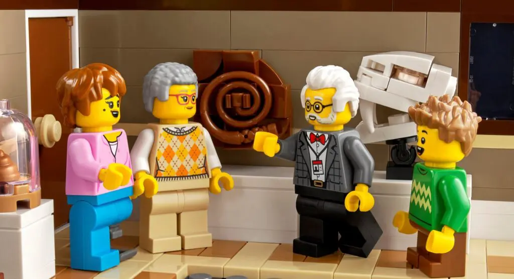 Group of Lego people talking indoors