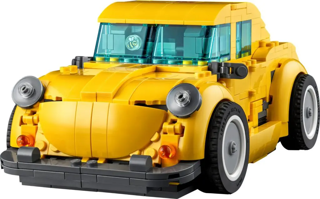 Yellow toy car with blue windows