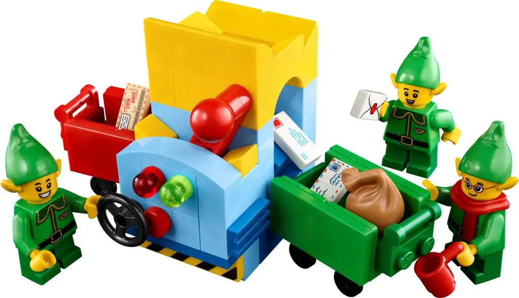 Festive elf figures handling holiday mail