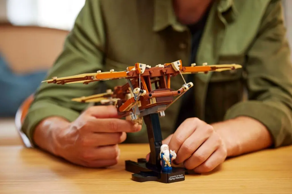 Model plane being assembled on table