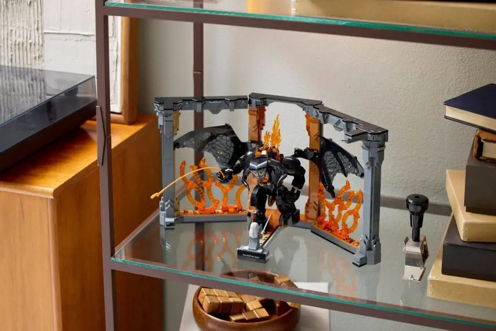 Lego dragon model on glass shelf