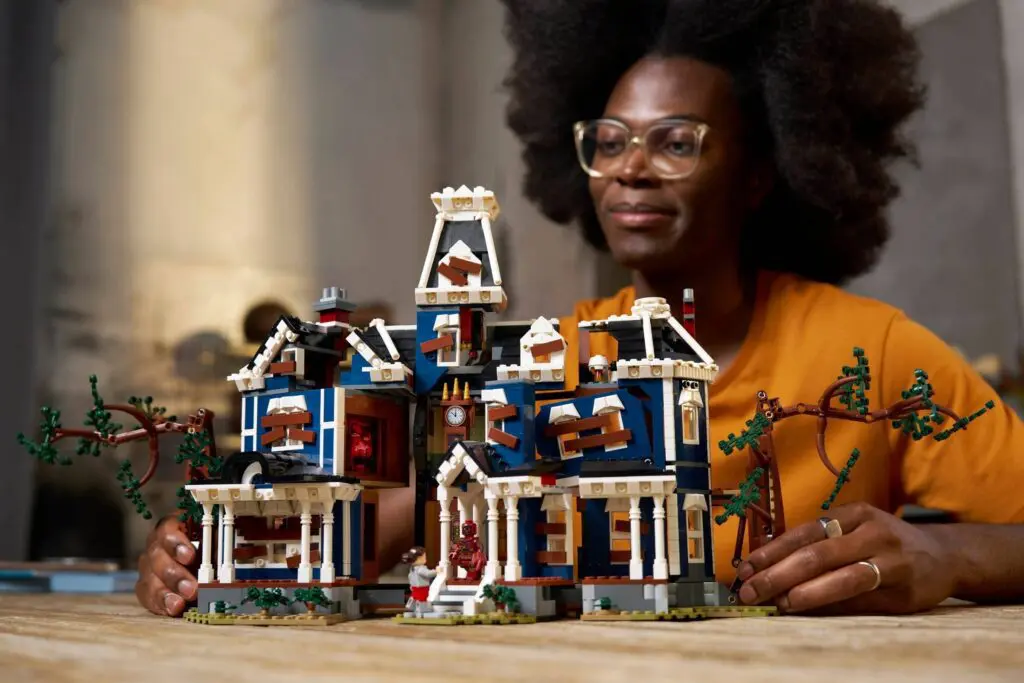 LEGO enthusiast with intricate building set