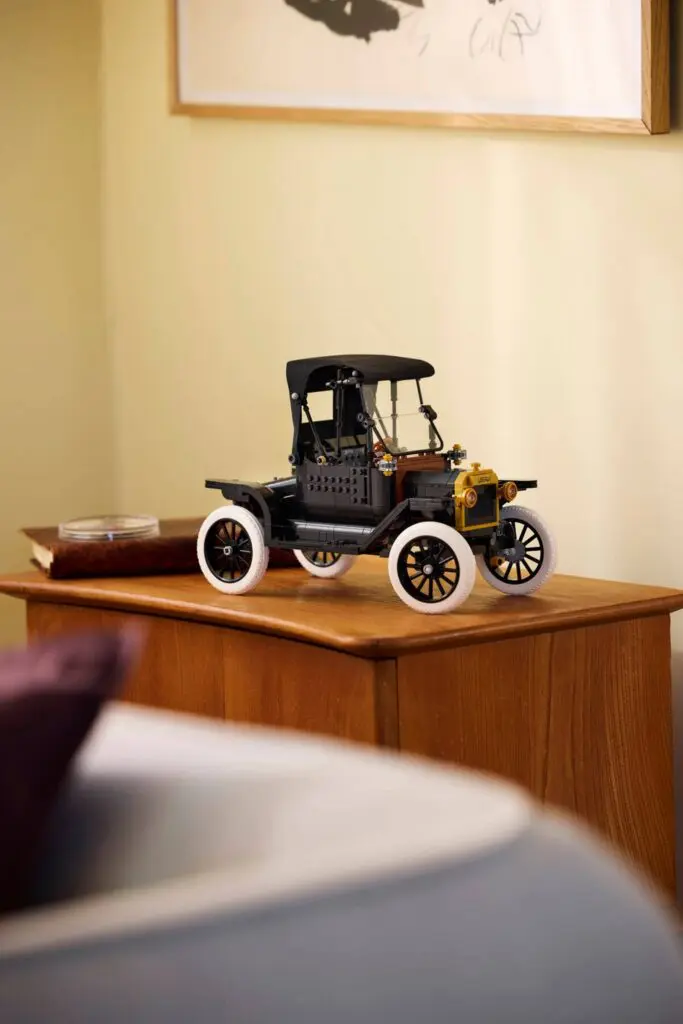 Antique car replica in cozy room