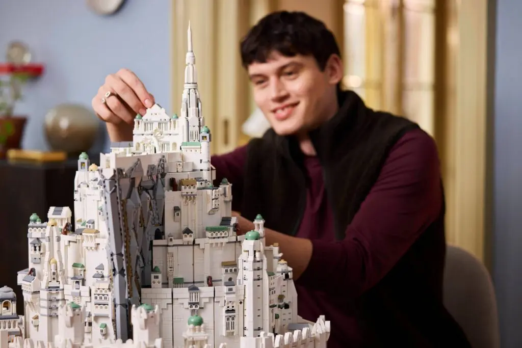 Enthusiast enjoying detailed LEGO construction