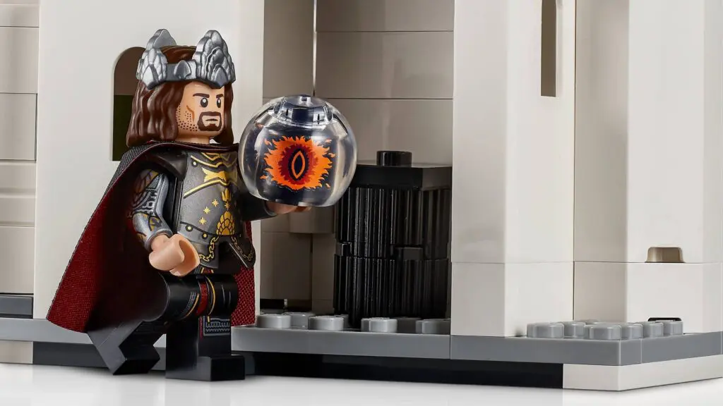 Toy figure with cape and mystical orb