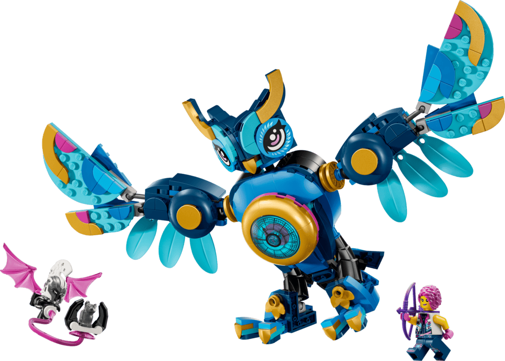 Mini dragon and figure beside toy owl