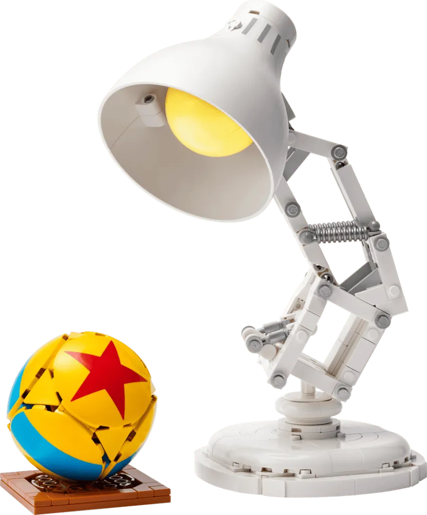 White lamp with yellow light and ball