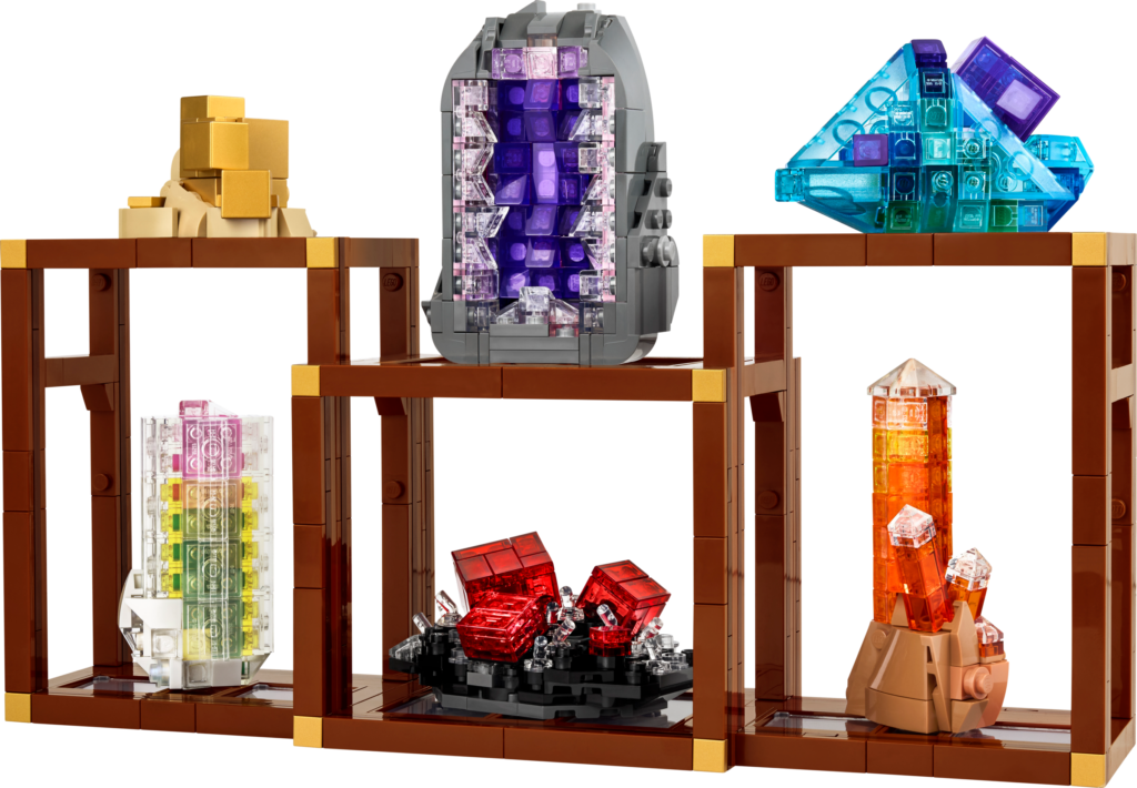 Colorful LEGO crystal display on wooden shelves.