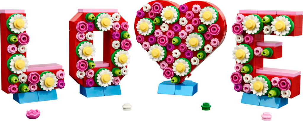 LEGO letters decorated with vibrant flowers.
