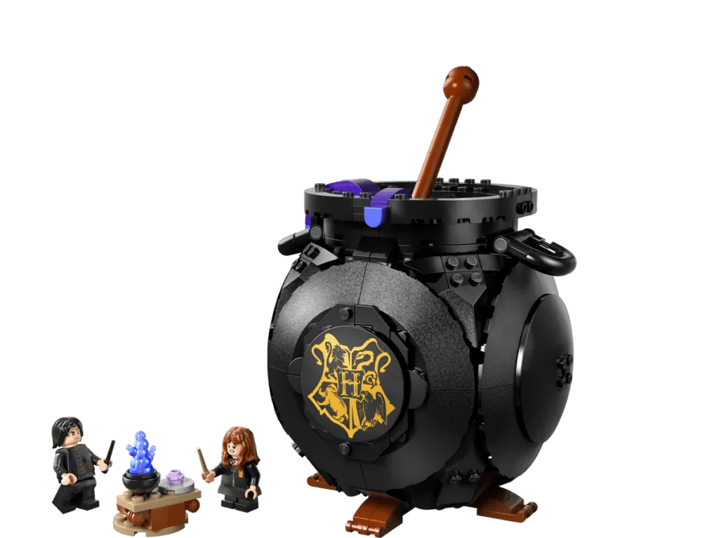 Magical toy cauldron with tiny figures