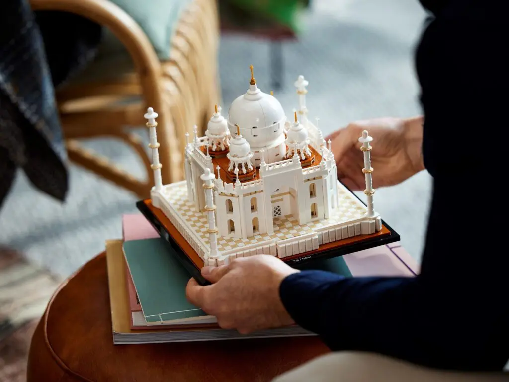 Model of Taj Mahal being held