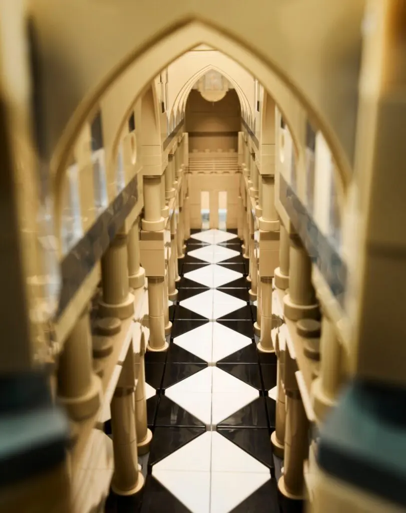 Symmetrical corridor with geometric flooring