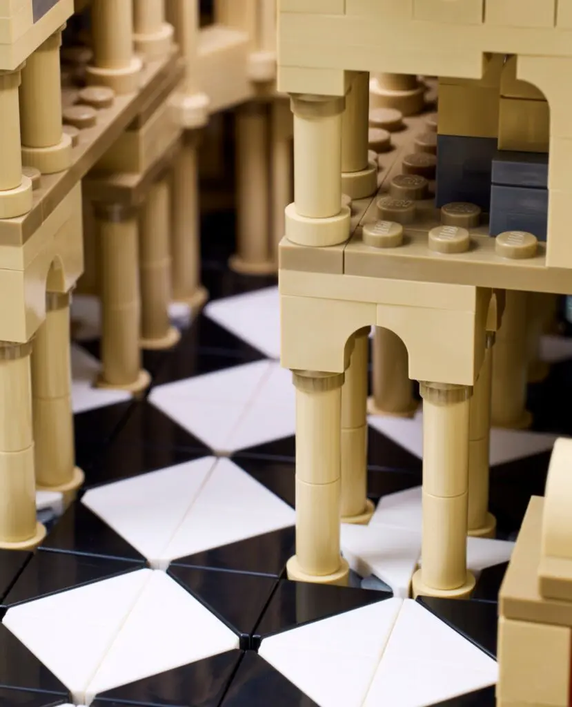 LEGO structure with pillars and tiled floor.