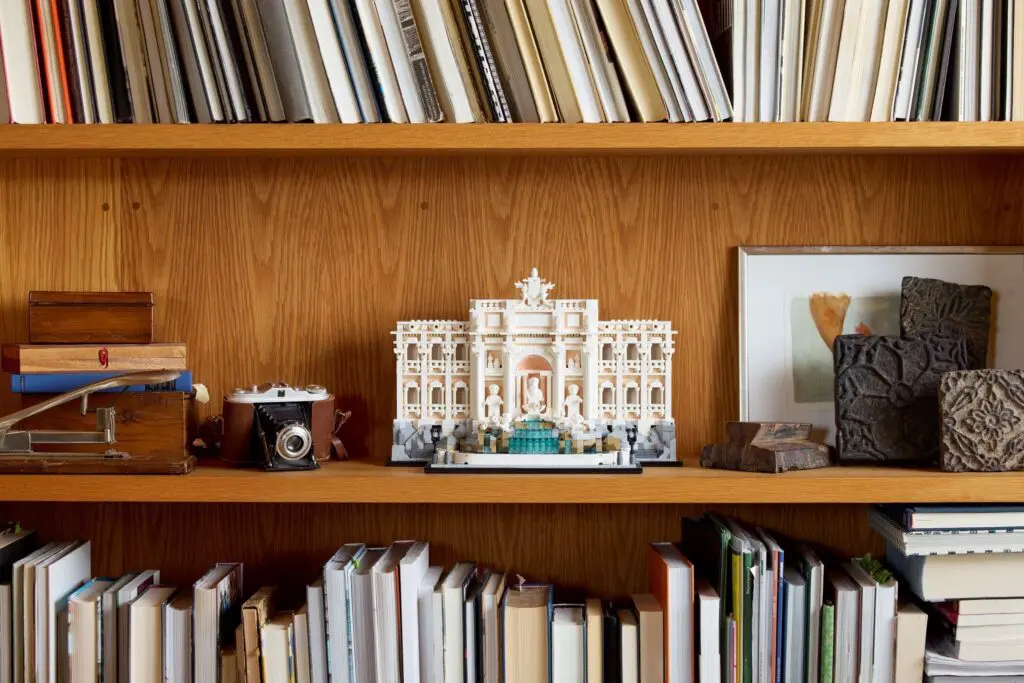 Wooden bookshelf with books and decor