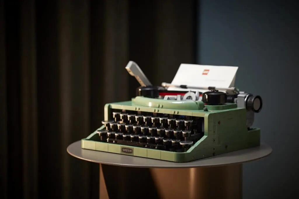 Green vintage typewriter on round table