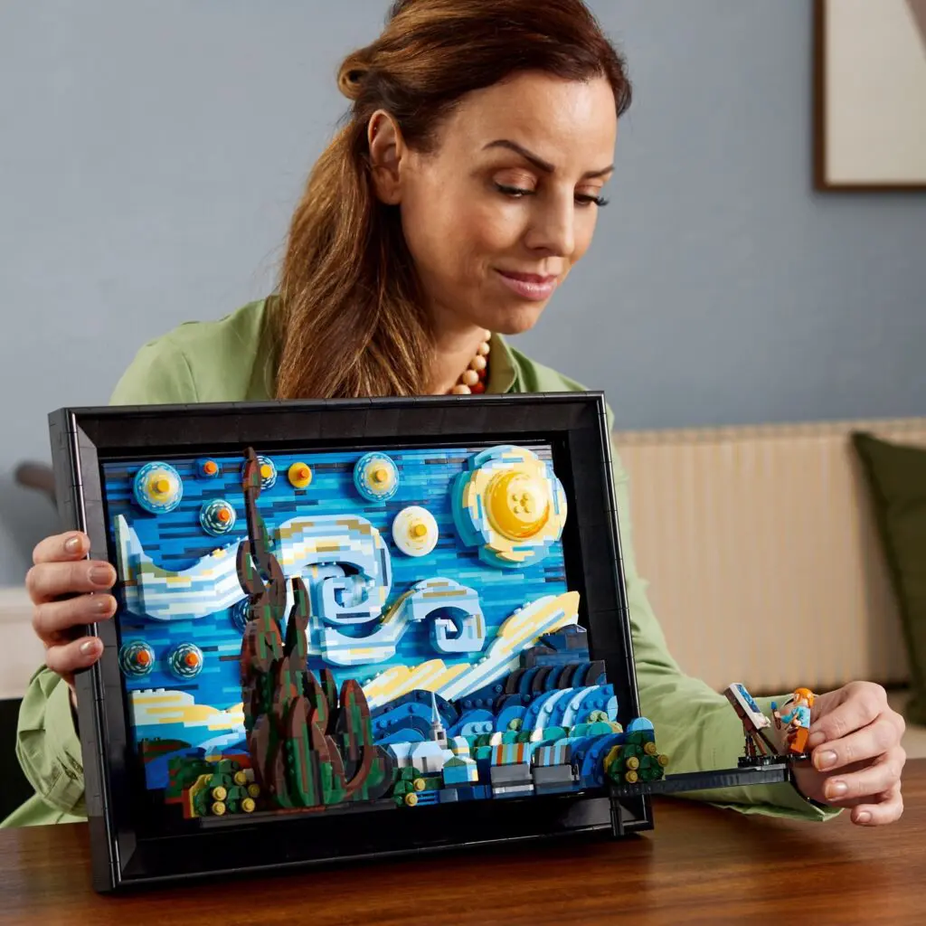 Woman holding Starry Night Lego set