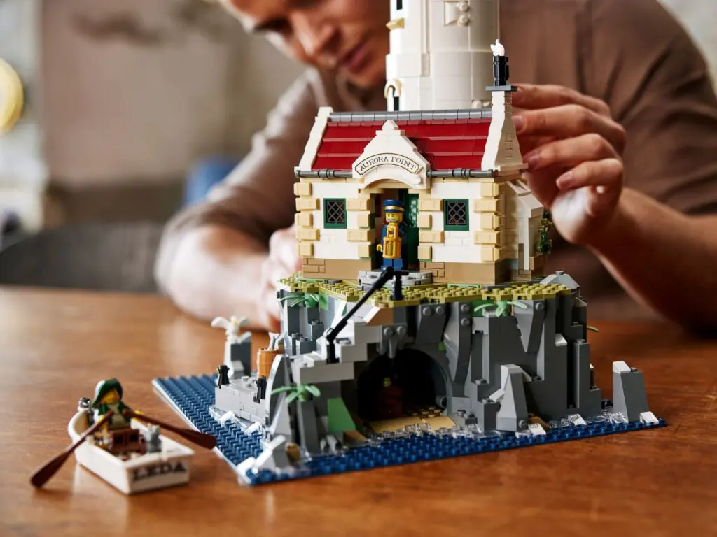 LEGO lighthouse set being assembled on table