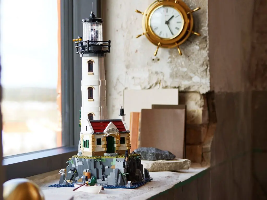 LEGO lighthouse model by a window