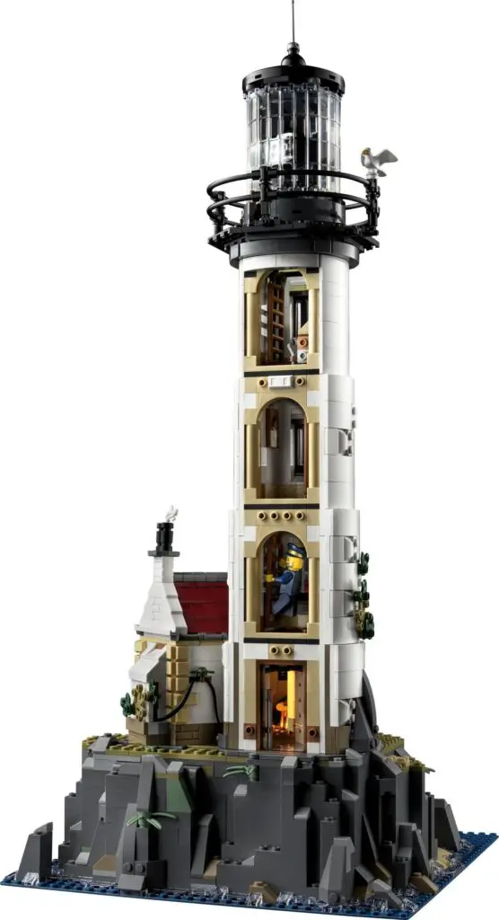 Lego lighthouse model on rocky base