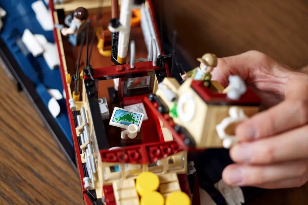 Hand assembling detailed toy ship