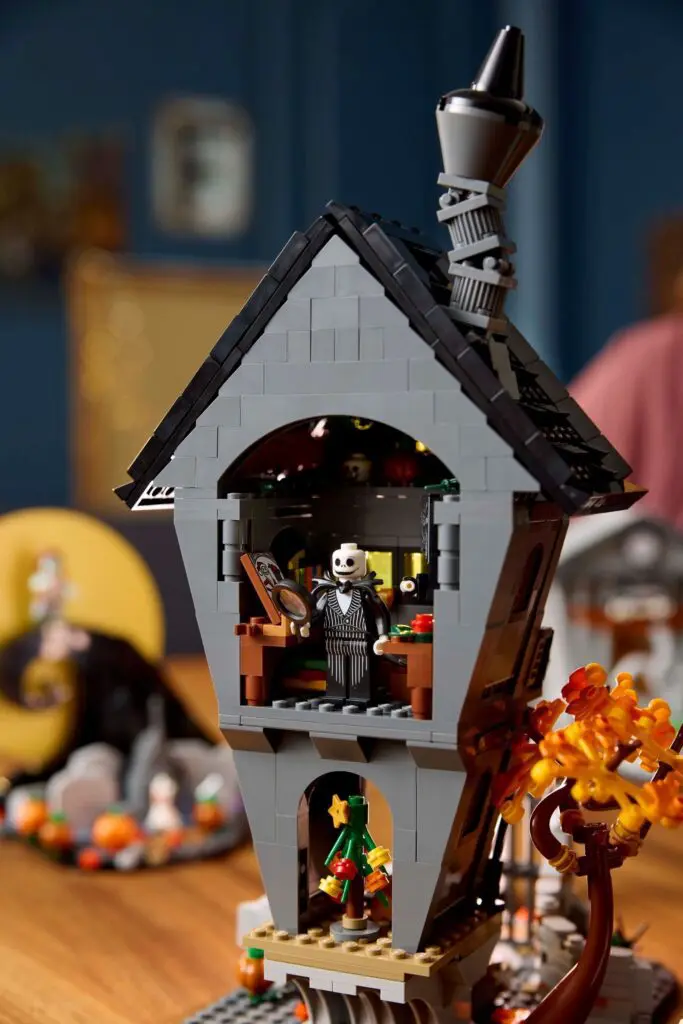 Haunted LEGO building with autumn tree