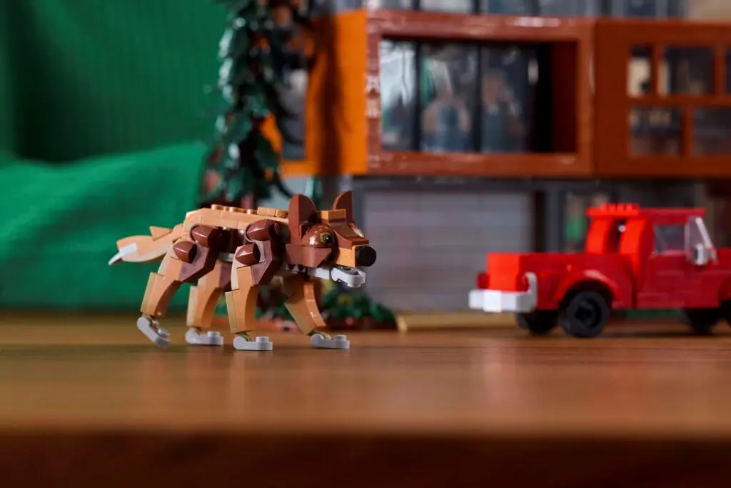 LEGO wolf figure near toy vehicle
