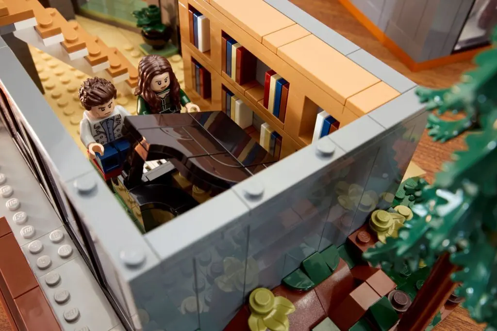 LEGO figures playing piano in library