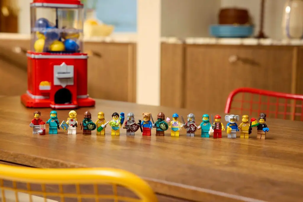 LEGO minifigures lined up on table