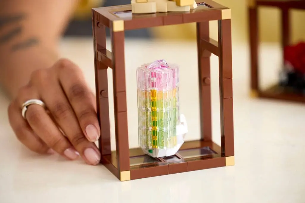 Hand holding a block construction