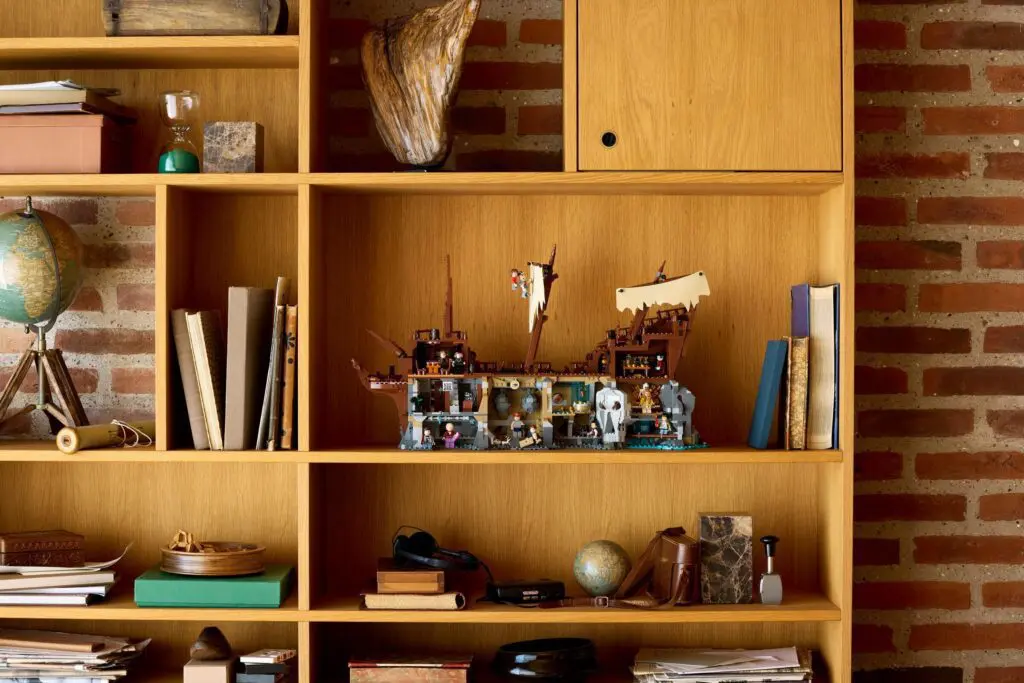 Wooden shelf with assorted books and decor
