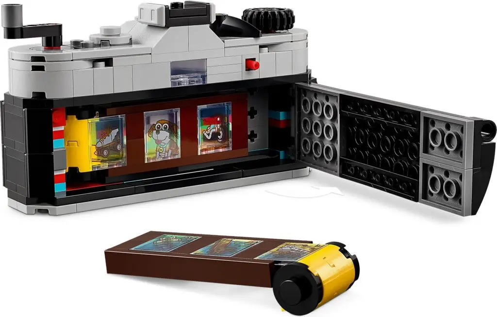 Vintage-style camera toy with film strip