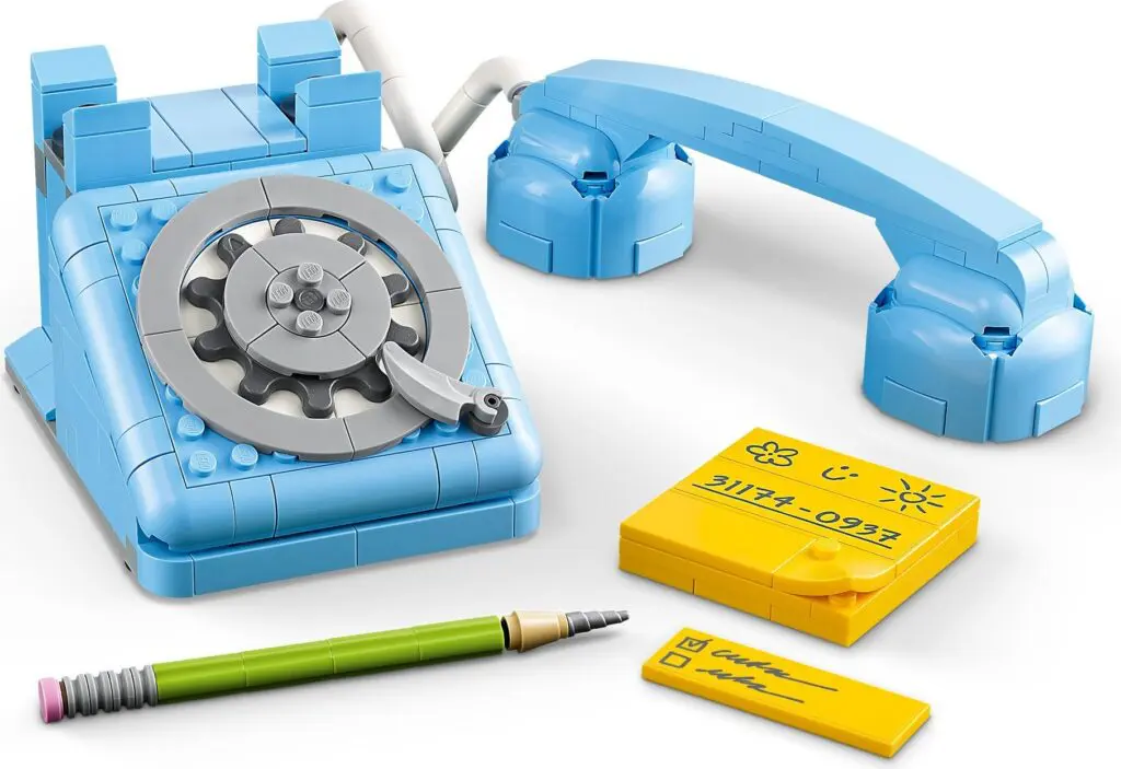 Vintage-style toy phone and accessories.