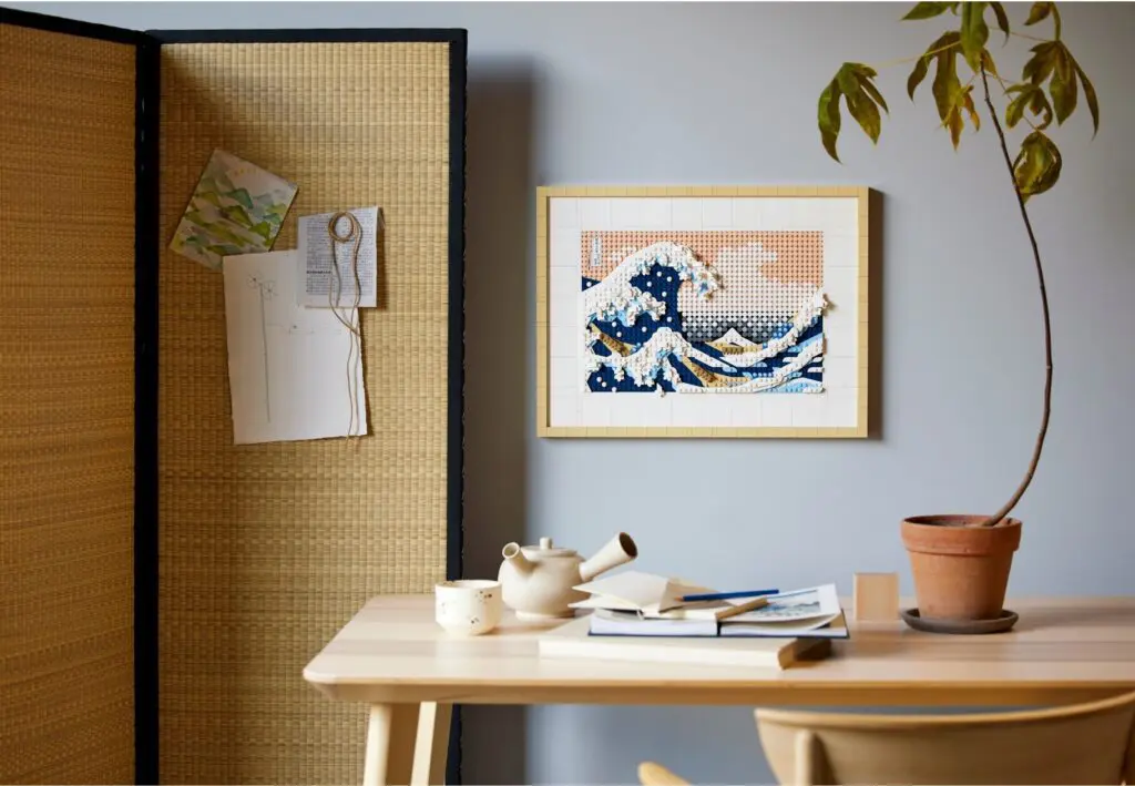 Minimalist workspace with potted plant.
