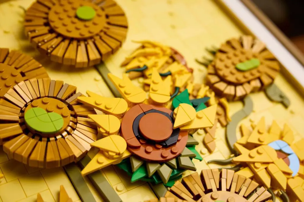 Lego sunflowers on a yellow background