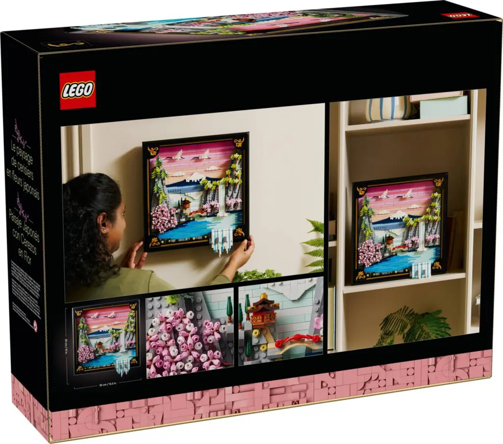 Woman hanging LEGO art piece