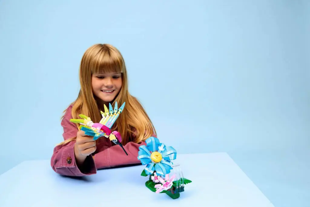 Child enjoying paper flower crafts