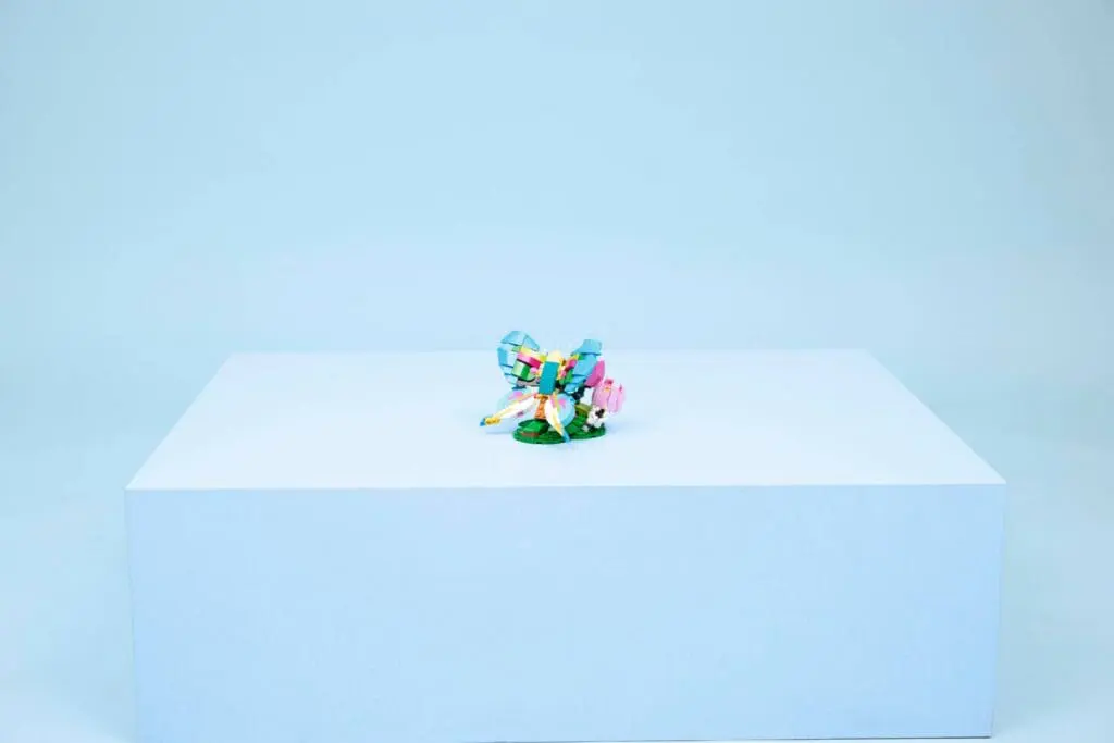 Vibrant model on a white platform