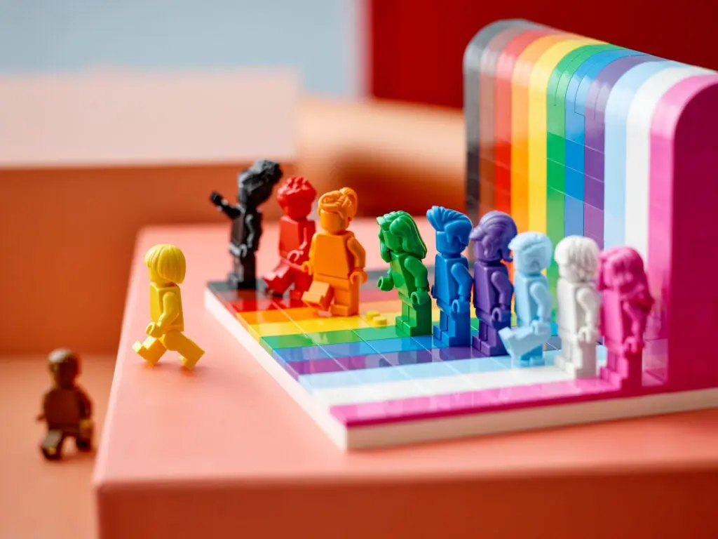 Miniatures on rainbow-colored platform