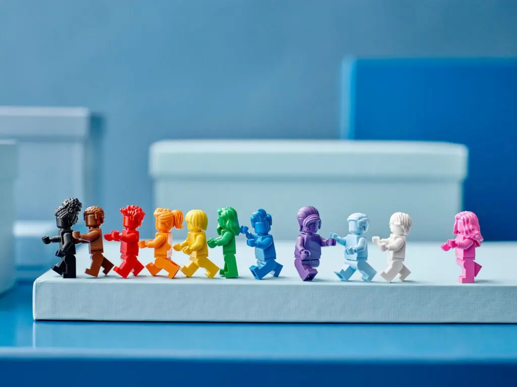 Rainbow-colored toy figures on display