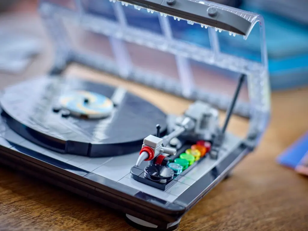 Miniature turntable on wooden surface
