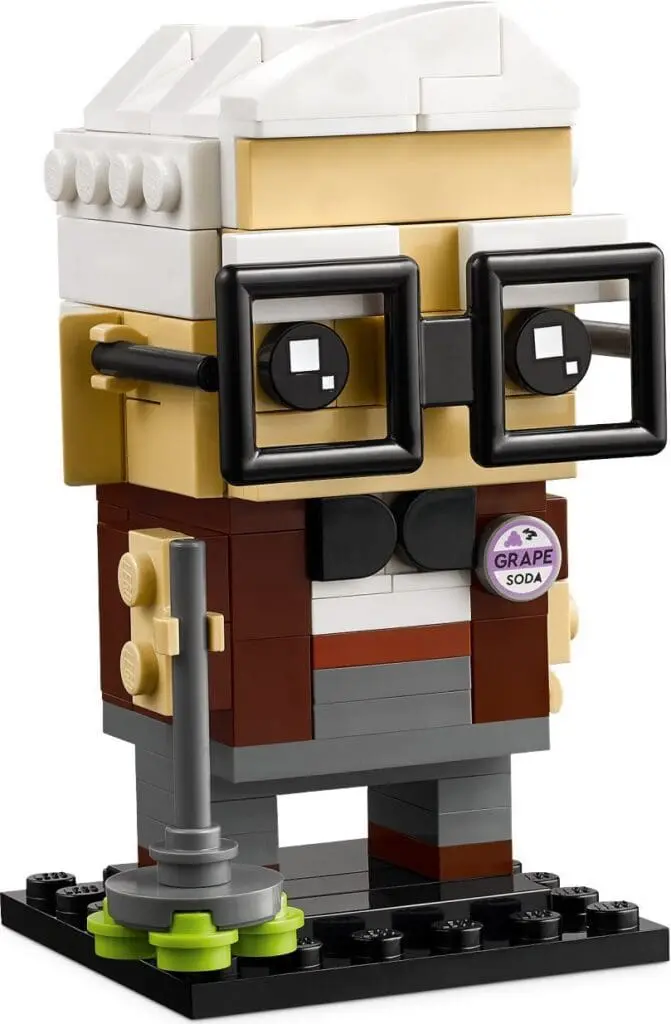 Toy figure with brown jacket and cane