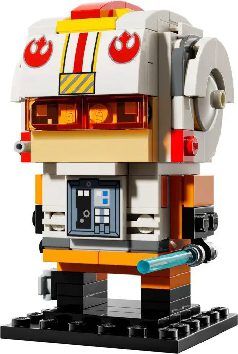 Toy figure in white and orange outfit