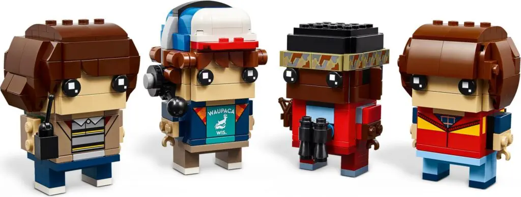 Four toy figures with accessories