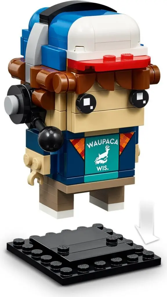 Brick character on display stand