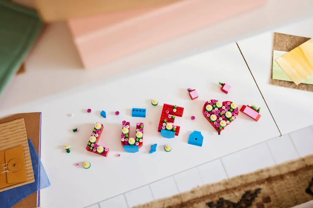 LEGO bricks forming a love message