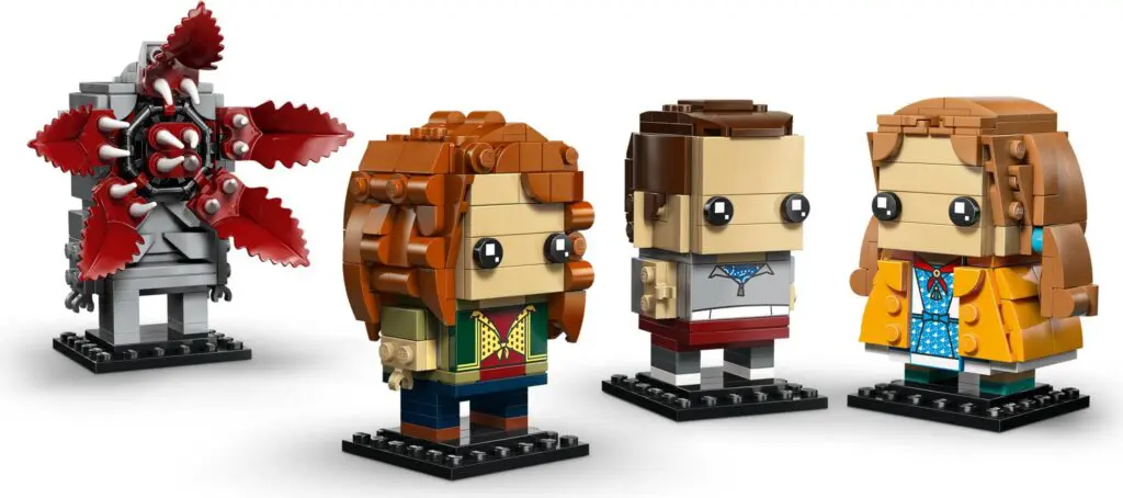 Block figures of four characters in a line
