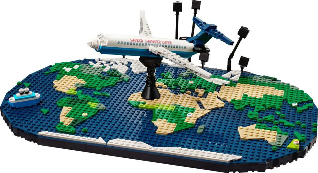 Airplane model on globe-themed base.